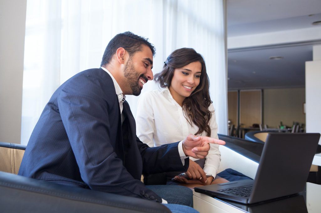 Business couple with computer